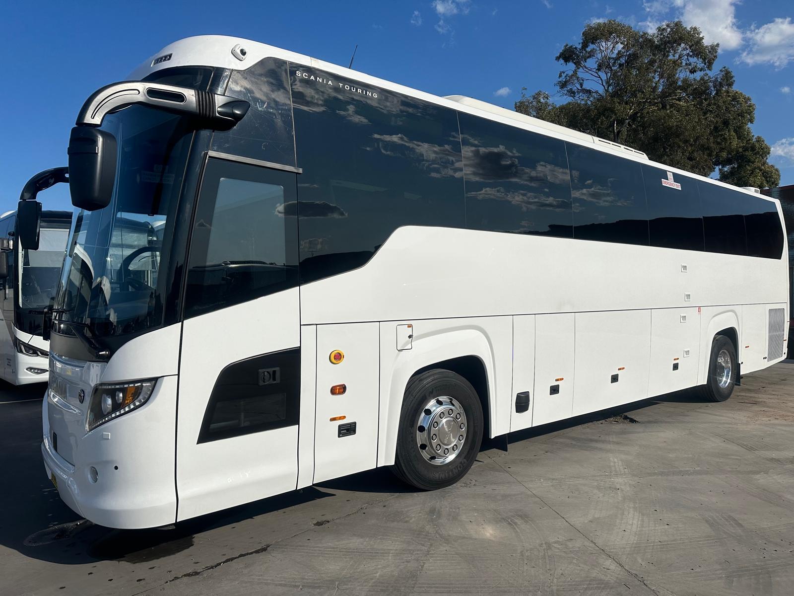A full-size coach, rear three-quarter view