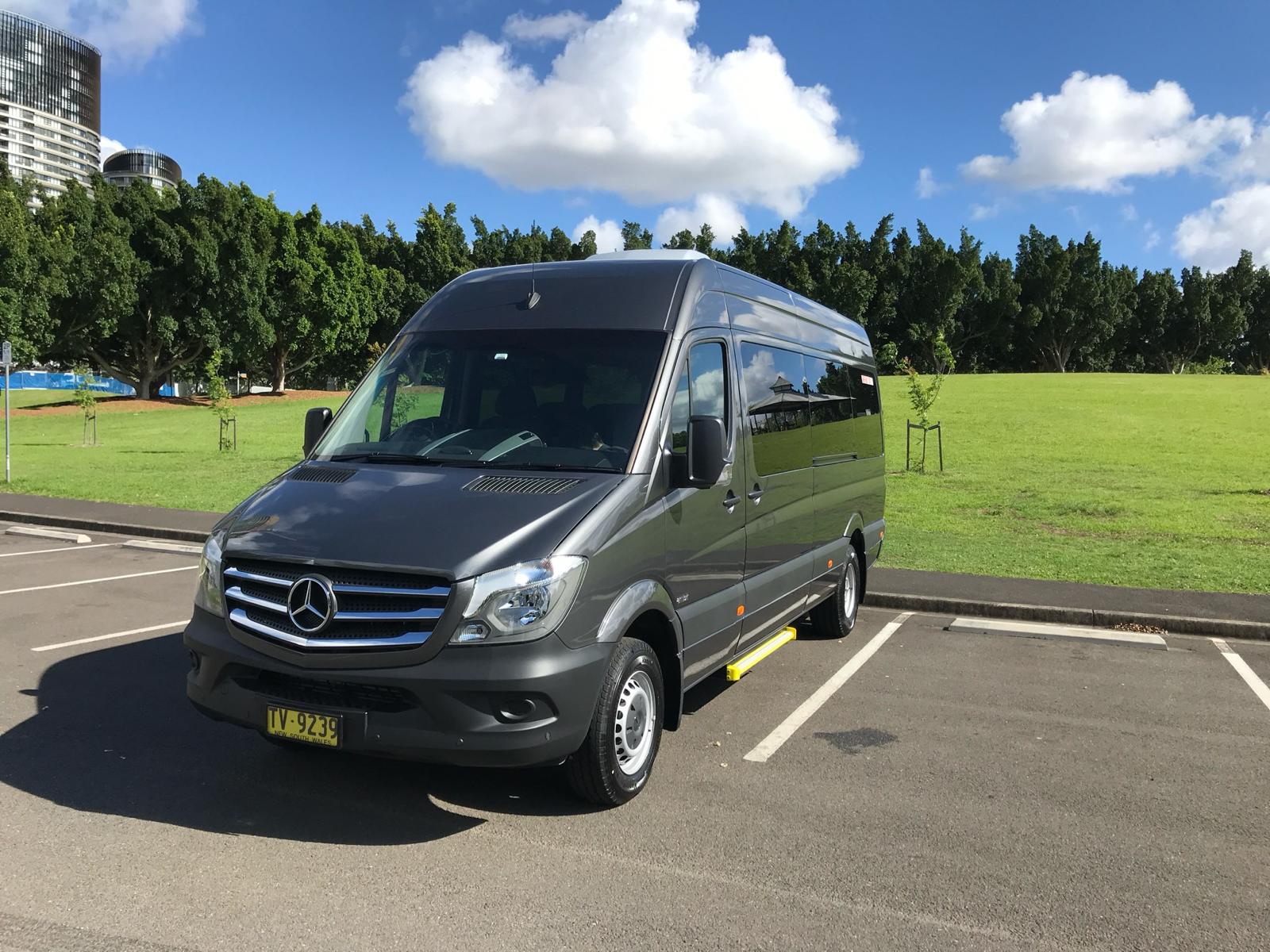 A seven-seat people mover parked in the sun