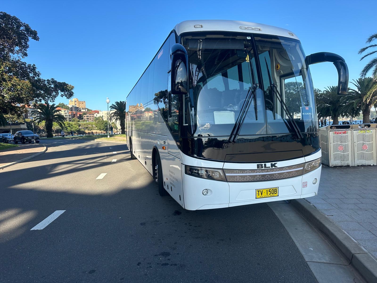 A coach travelling on an open road