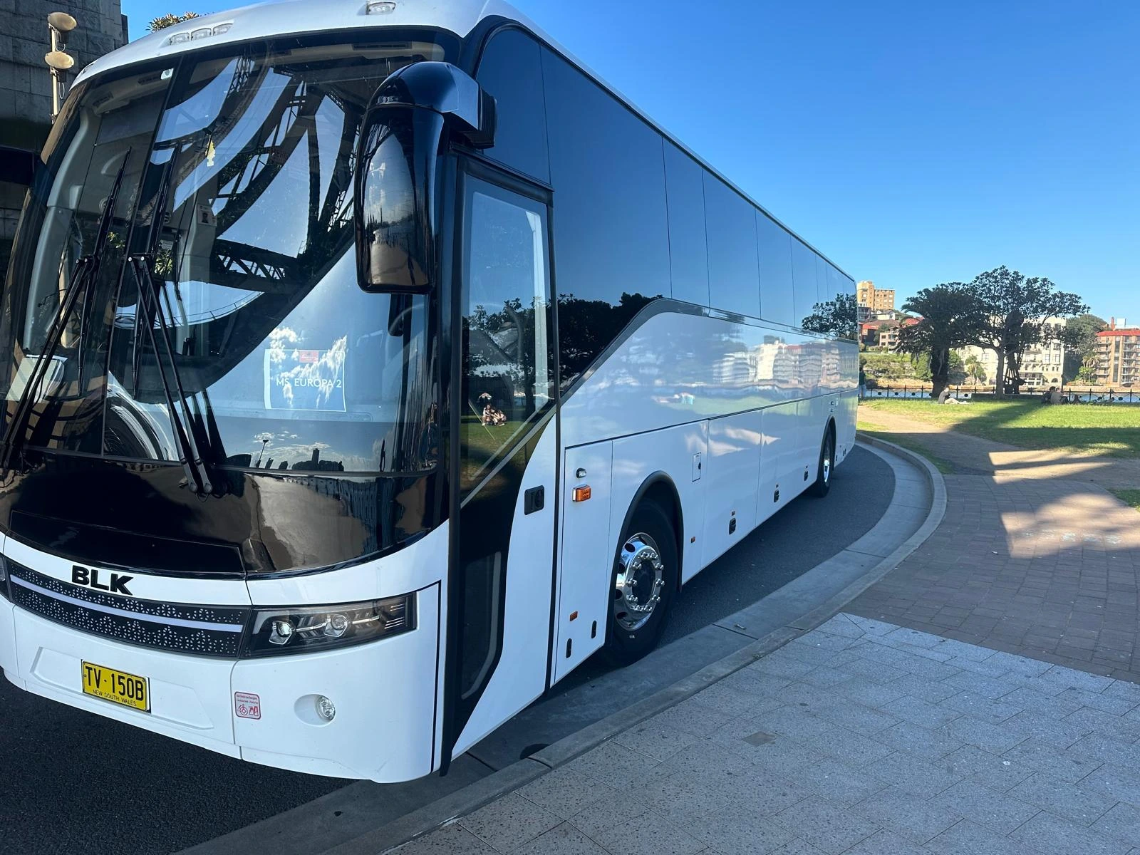 A coach parked at a wedding venue