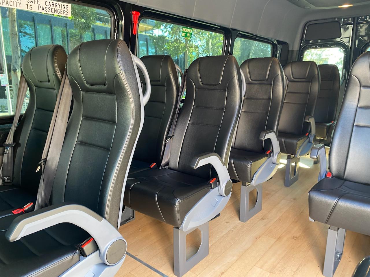 Coach seating with headrests and curtains